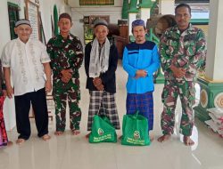 Usai Sholat Jumat, Satgas TMMD ke-125 Kodim 0321/Rohil Bagikan Paket Sembako Kepada Lansia dan Anak Yatim