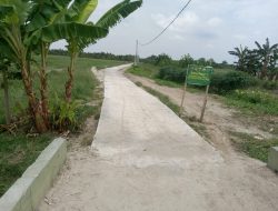 Semenisasi Jalan SK 7 Selesai 100 Persen, Gotong Royong Satgas TMMD ke-125 Kodim 0321/Rohil dan Warga Wujudkan Infrastruktur Impian